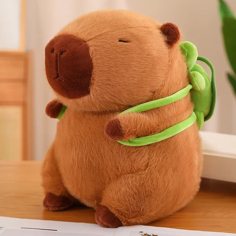 Juguete de peluche capibara con mochila y sombrero